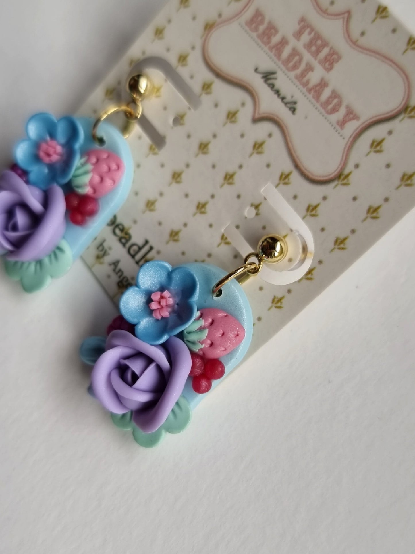 Colorburst Strawberry Blue Purple dangling earrings